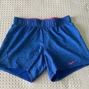 Nike Women's Blue Athletic Shorts with Pink Swoosh